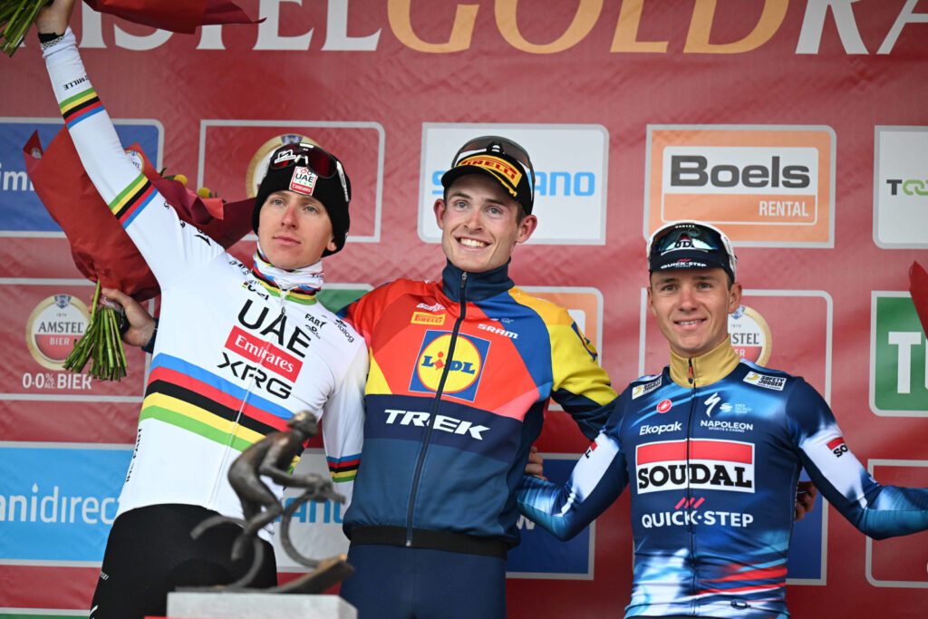 Mattias Skjelmose on the podium of Amstel 2025 with Remco and Tadej