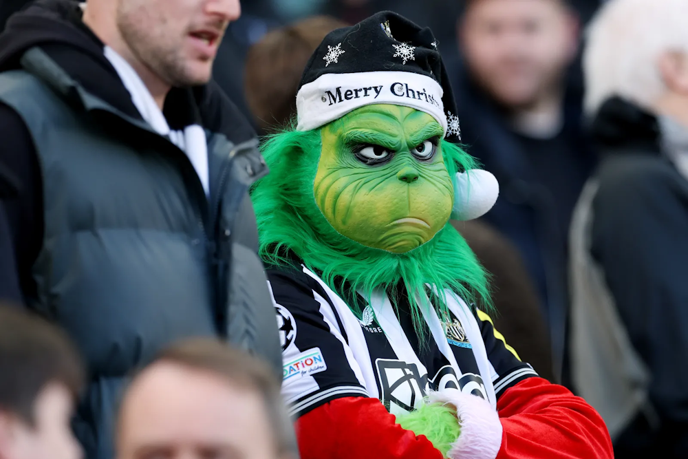 Newcastle fan shows up to his team's game dressed as the Grinch